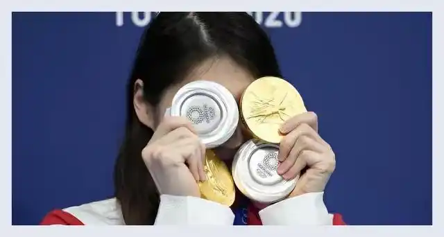 游泳拿奥运冠军_游泳奥运冠军拿多少奖金_游泳奥运冠军拿什么奖